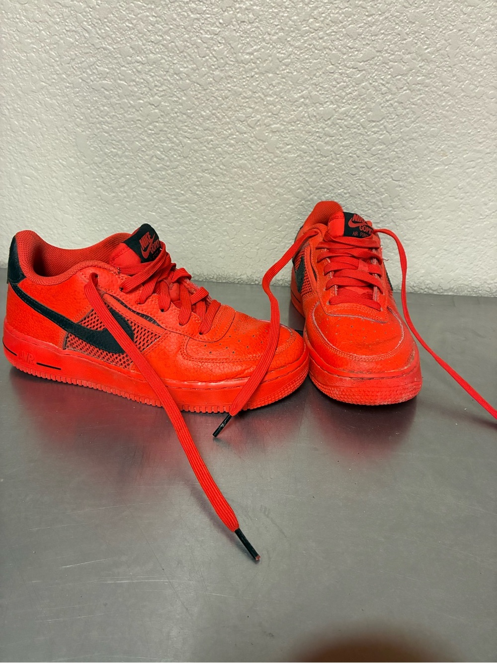 Nike Men's Athletic Shoes in Vibrant Red with Black Swoosh